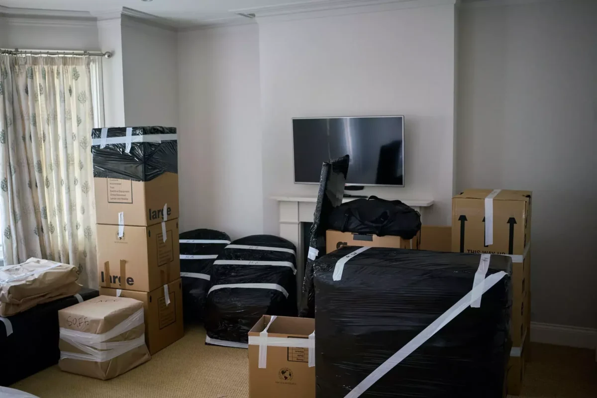 Carefully packed and wrapped furniture ready for loading during a move