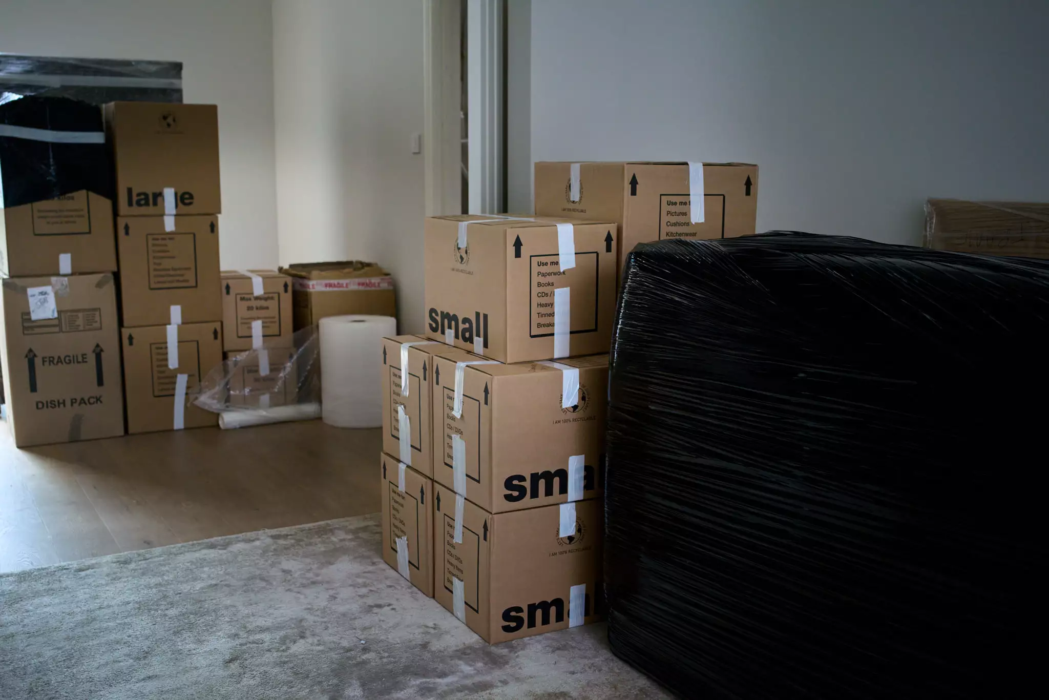 packing of boxes by Best London Removals Ltd