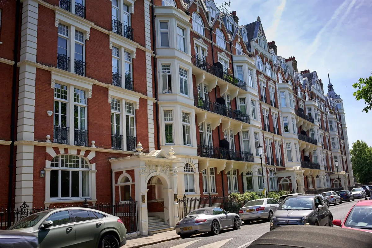 Red-brick Victorian mansion flats on London street