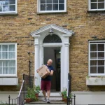 Moving man carry box