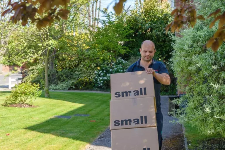 Moving man carry boxes