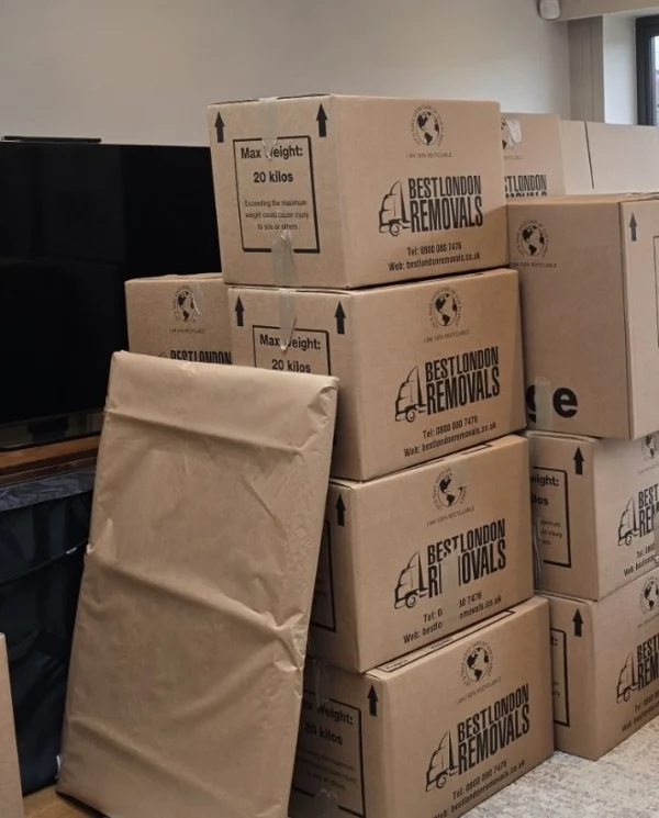 Stacked moving boxes labelled Best London Removals indoors