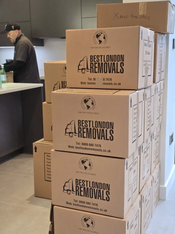 Stacked removal boxes in office interior