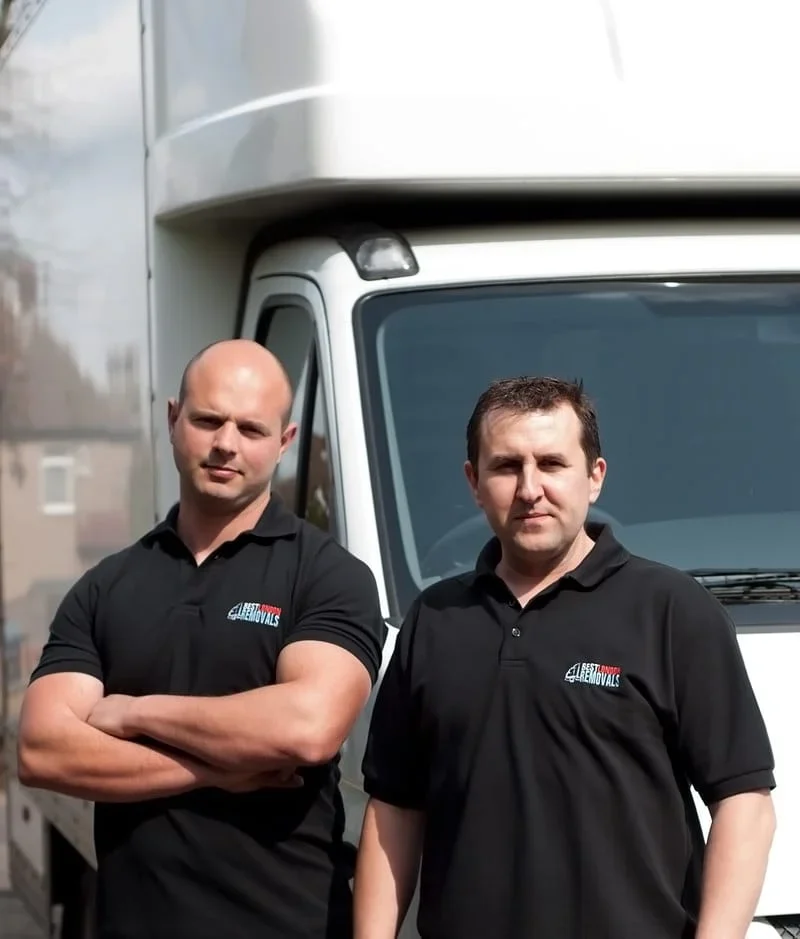 Two professional movers from Best London Removals standing in front of a removal van, ready for a Man and Van job.