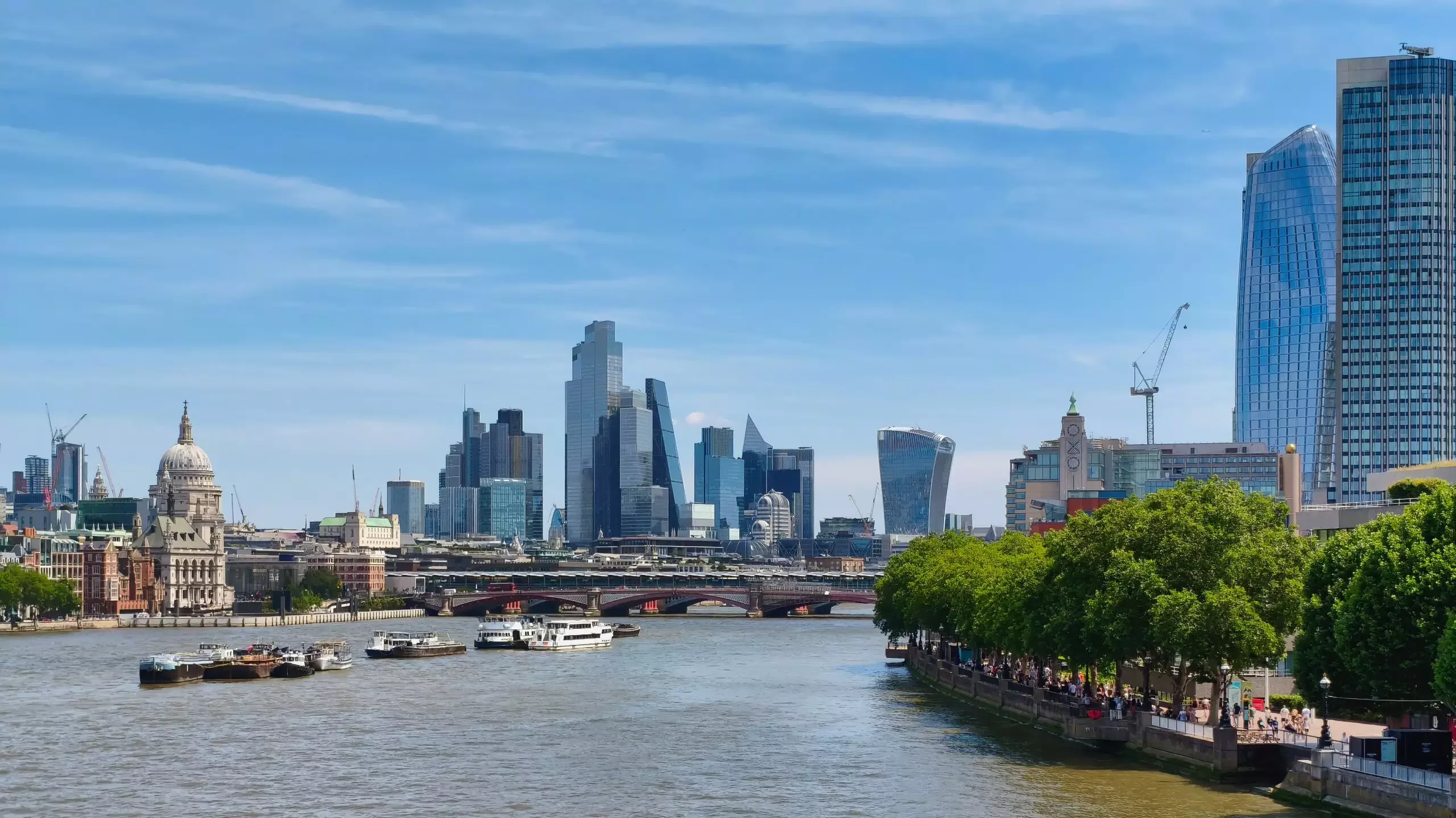 London skyline along the River Thames on a sunny day
