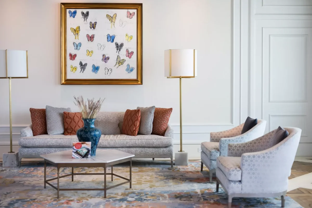 Bright and stylish living room with modern furniture and wall art, prepared for a professional house removal