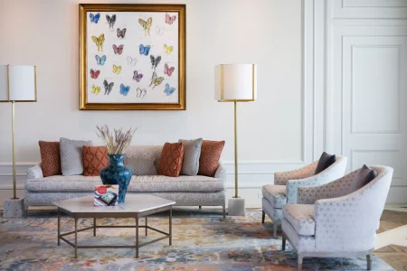 Bright and stylish living room with modern furniture and wall art, prepared for a professional house removal