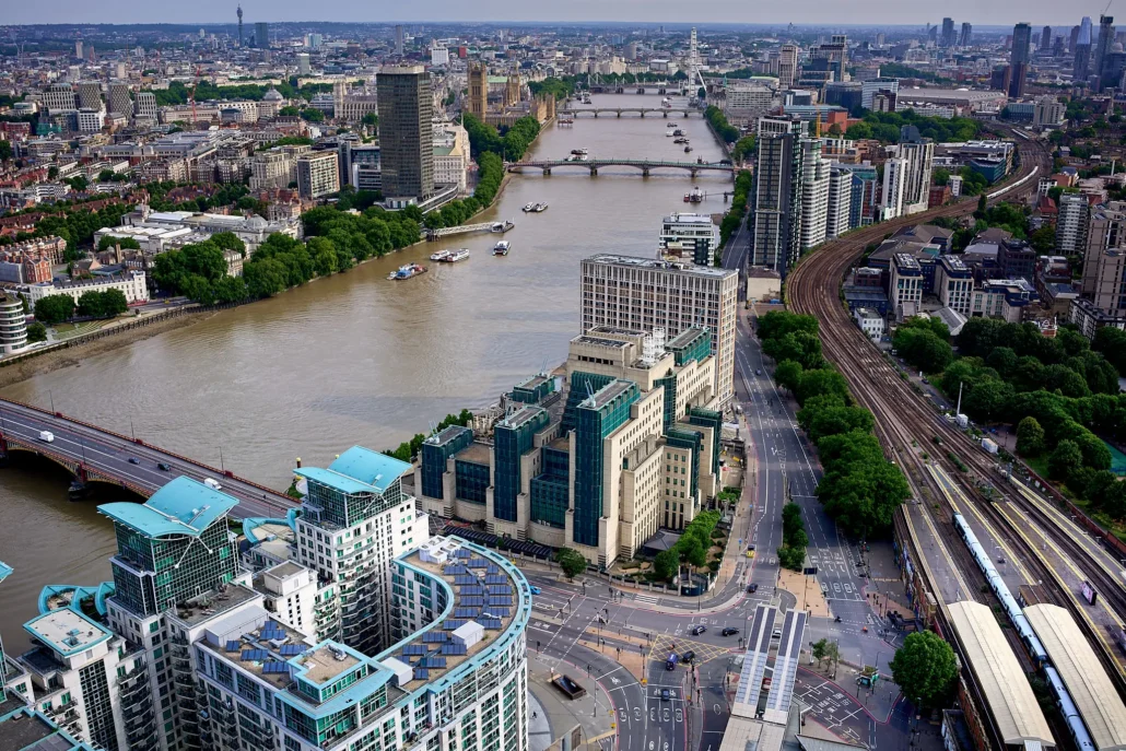 Aerial view of St George Wharf riverside apartments at Vauxhall with the Thames and Westminster beyond